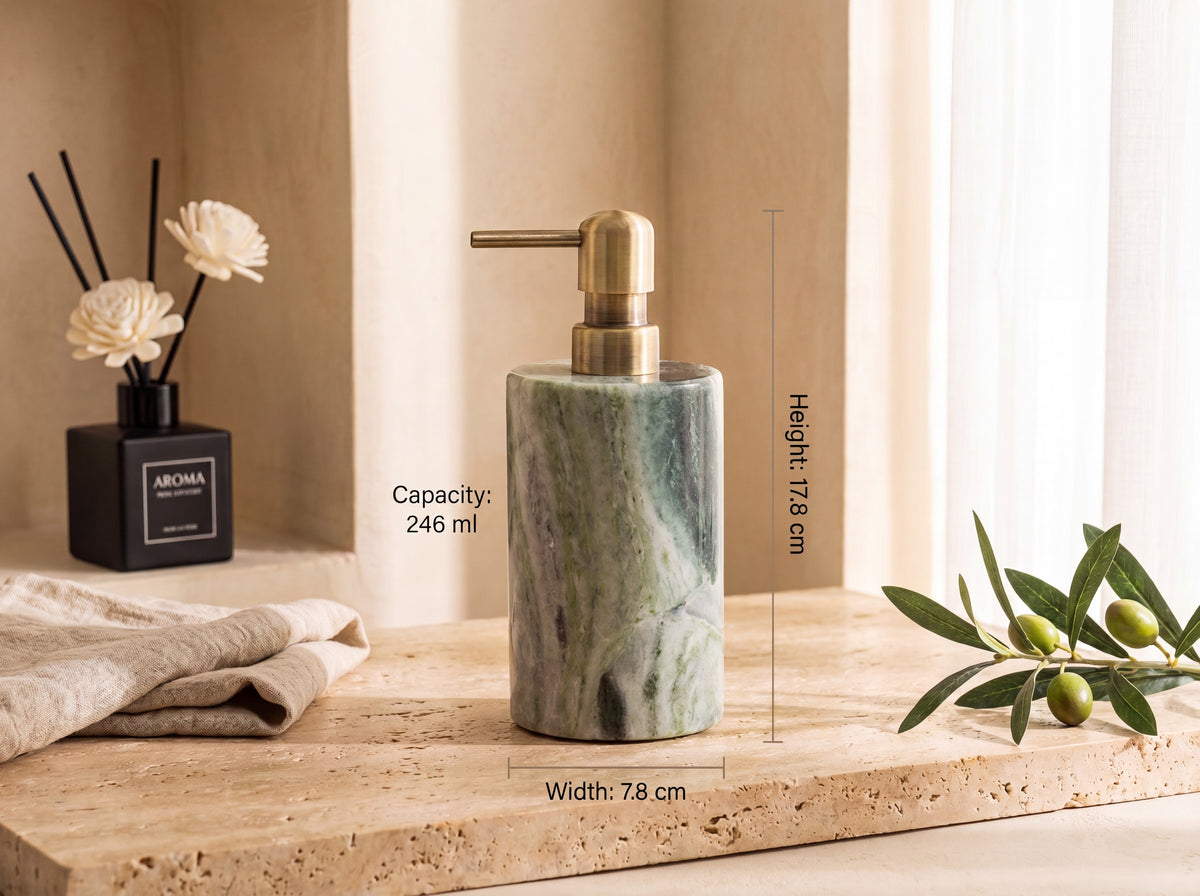 Green marble lotion dispenser with size labels: Height 17.8 cm, Width 7.8 cm, Capacity 246 ml, on a warm travertine backdrop.
