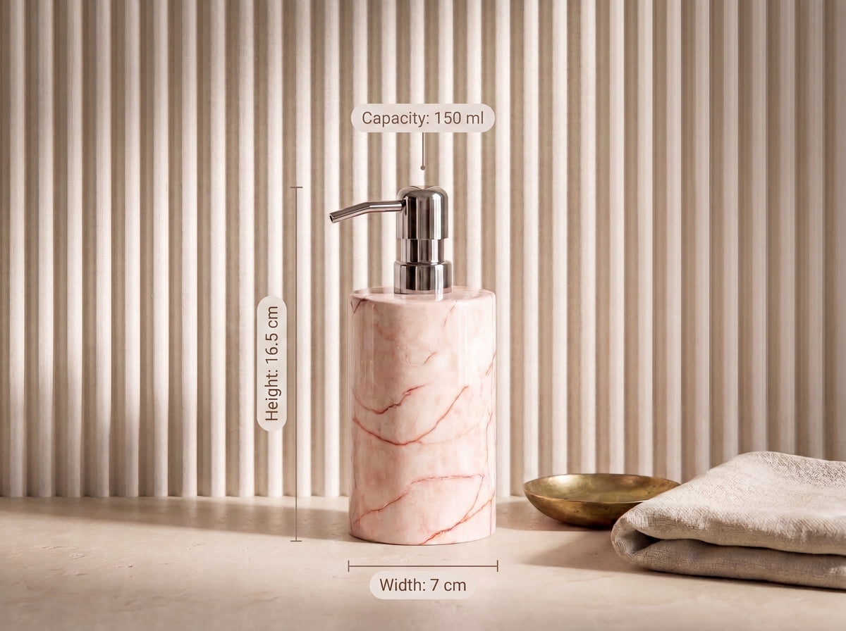 Pink marble soap dispenser with size labels: Height 16.5 cm, Width 7 cm, Capacity 150 ml, on a fluted cream backdrop.